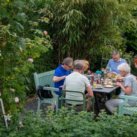 Guests enjoying breakfast in the garden
